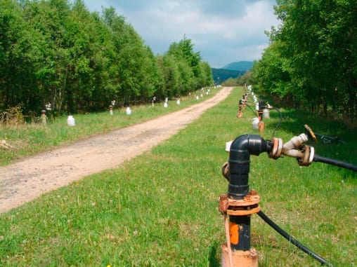 In-situ leach mining of uranium on a green patch of land.